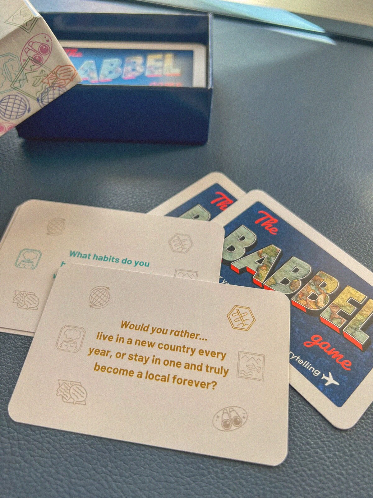 Babbel cards fanned out next to the open box