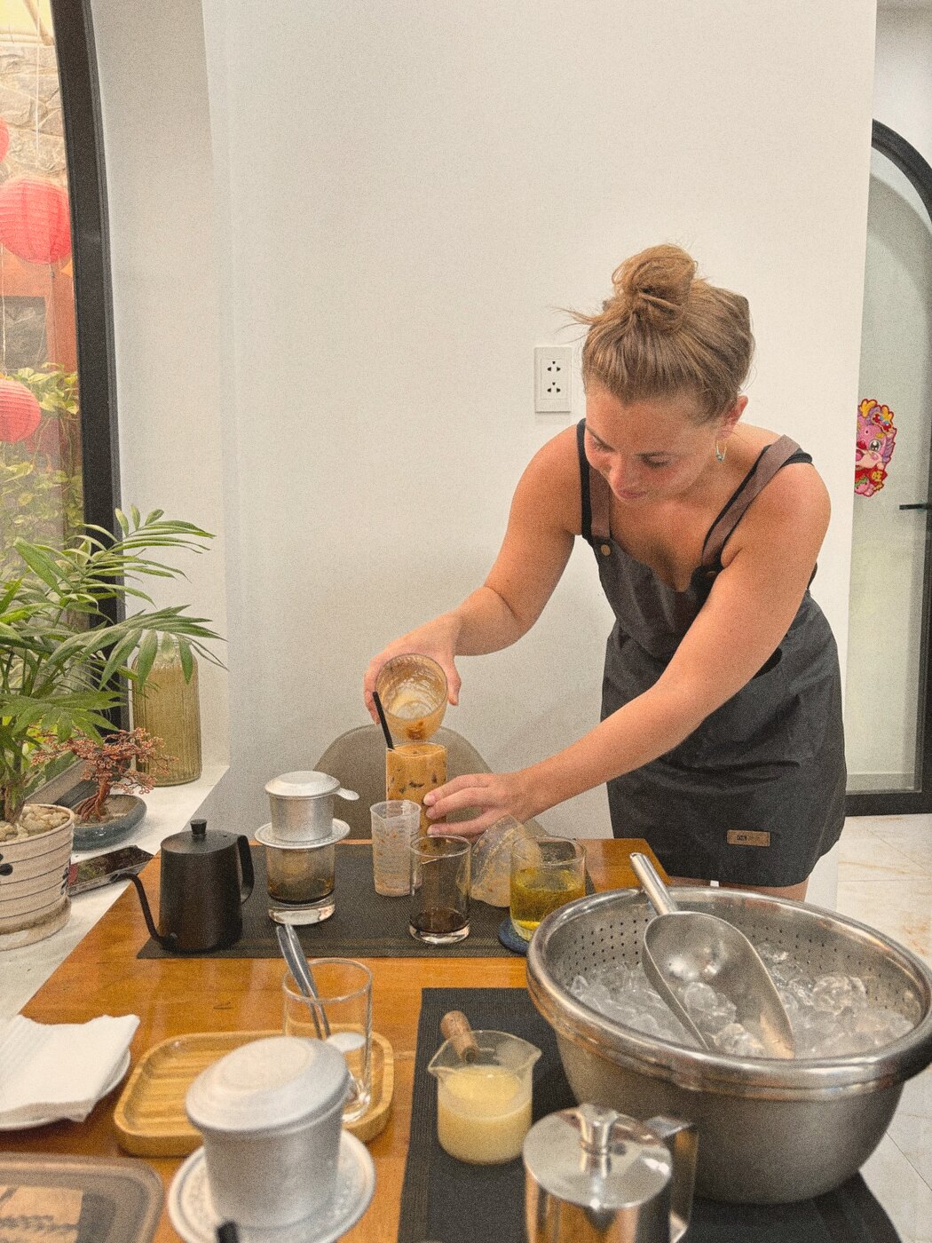 Pouring Vietnamese iced coffee