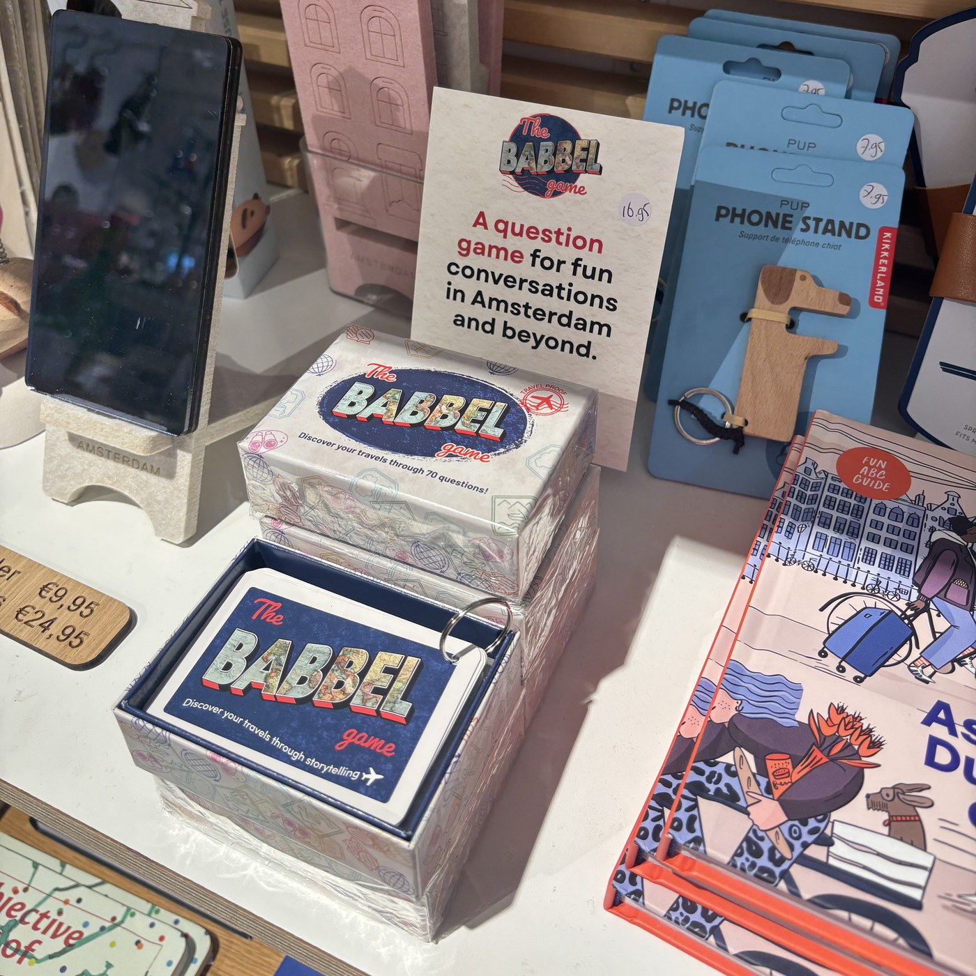 The Babbel Game on the shelf at concept store Spiegel in Amsterdam, next to Amsterdam souvenirs